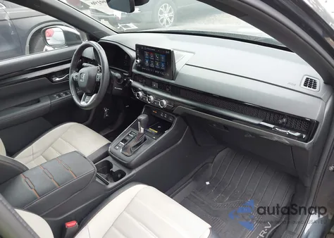 2023 Honda Cr-V Hybrid Sport Touring from USA, damaged, VIN 7FARS6H96PE022950